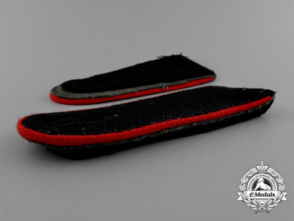 a_mint_matching_pair_of_waffen-_ss_artillery_enlisted_man’s_shoulder_straps_e_0140