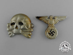 A Set Of Ss Visor Cap Insignia; Eagle And Skull