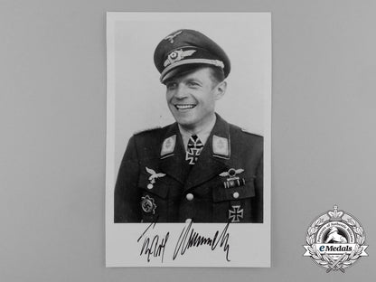 a_post_war_signed_photograph_of_luftwaffe_ace_and_knight’s_cross_recipient_karl_rammelt_e_0235