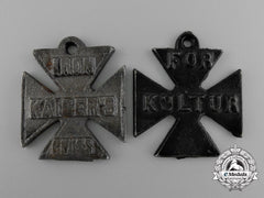 A Grouping Of Two First War British Anti-German Propaganda Medal Against German Excesses