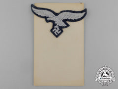 A Luftwaffe Nco/Em Breast Eagle On Its Original Salesman Board