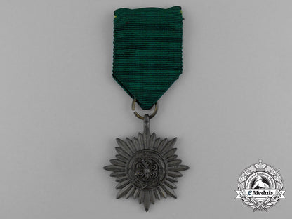 germany,_heer._a_bronze_grade_ostvolk_merit_medal_in_its_original_packet_of_issue_e_0475