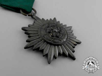 germany,_heer._a_bronze_grade_ostvolk_merit_medal_in_its_original_packet_of_issue_e_0478