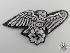 A Tunic Removed German National Air Protection League (Reichsluftschutz) Eagle Insignia
