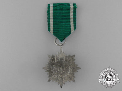 a_silver_grade_eastern_people_bravery_decoration;2_nd_class_in_its_original_packet_of_issue_e_1018