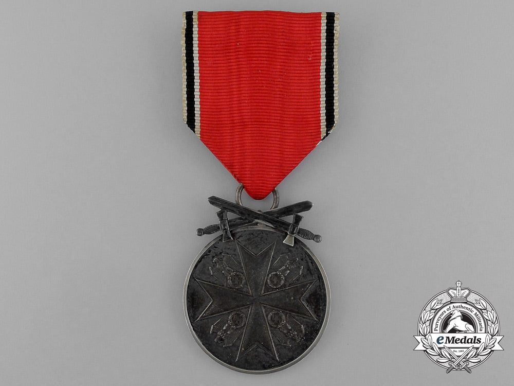 germany._an_eagle_order_silver_medal_with_swords,_by_the_official_viennese_state_mint_e_1050