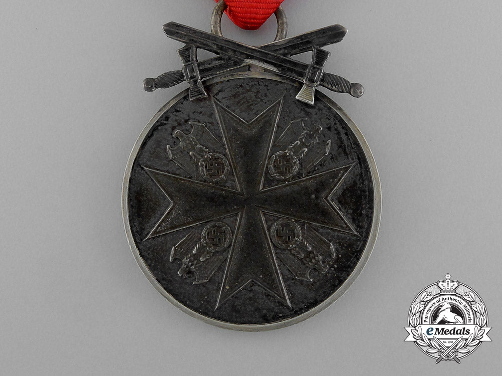 germany._an_eagle_order_silver_medal_with_swords,_by_the_official_viennese_state_mint_e_1051