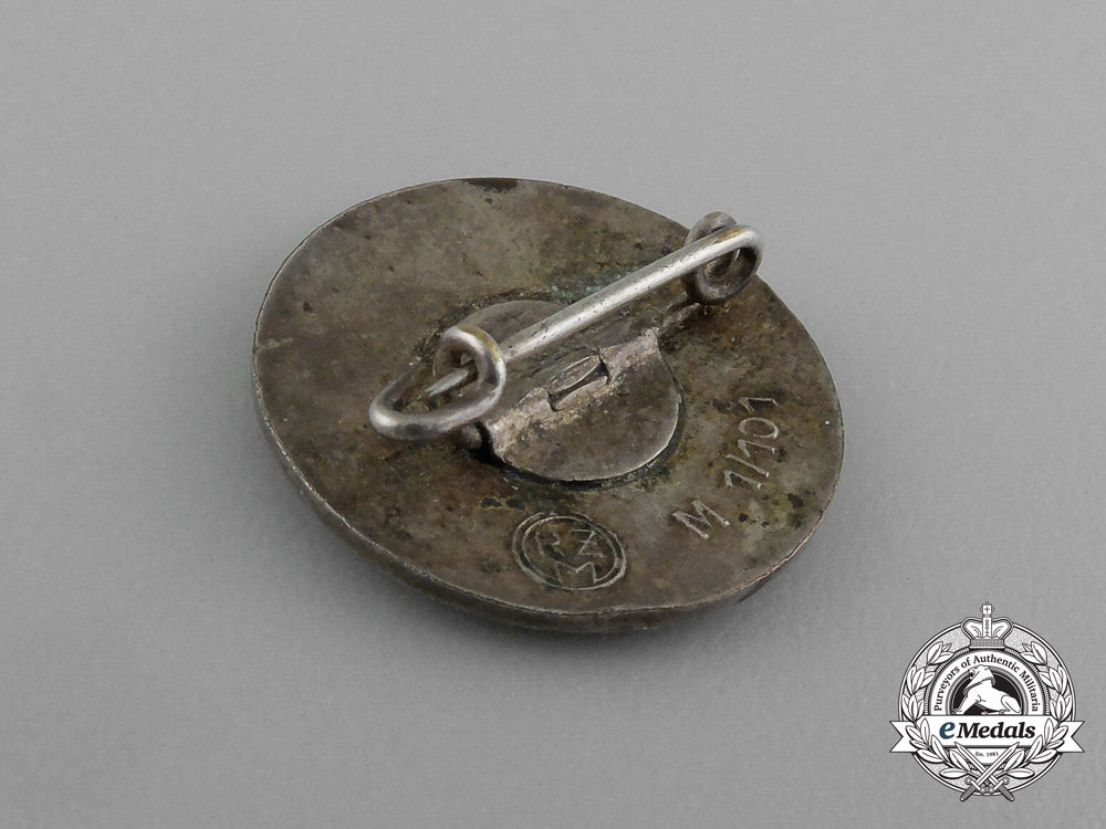 a_nsdap_party_member’s_lapel_badge_by_gustav_brehmer_of_markneukirchen_e_1063