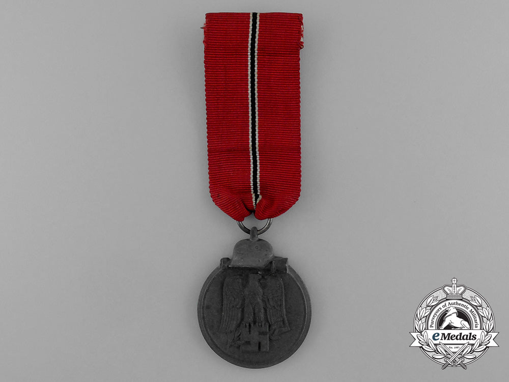 a_eastern_campaign_medal1941/1942_in_its_original_packet_of_issue_by_steinhauer&_lück_of_lüdenscheid_e_1163