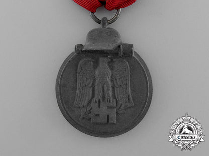 a_eastern_campaign_medal1941/1942_in_its_original_packet_of_issue_by_steinhauer&_lück_of_lüdenscheid_e_1164