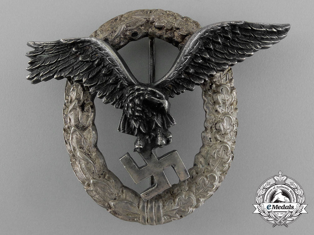 an_early_quality_luftwaffe_pilot’s_badge_by_c.e_juncker_of_berlin_e_1168
