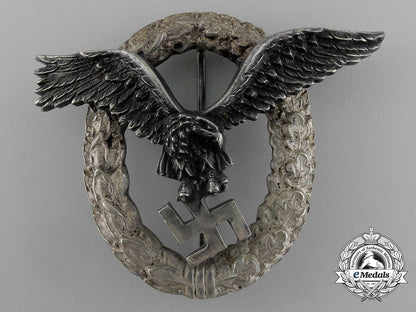an_early_quality_luftwaffe_pilot’s_badge_by_c.e_juncker_of_berlin_e_1168