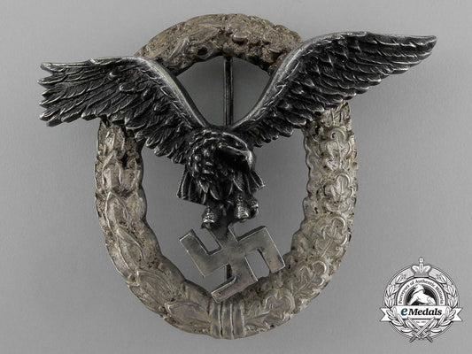 an_early_quality_luftwaffe_pilot’s_badge_by_c.e_juncker_of_berlin_e_1168