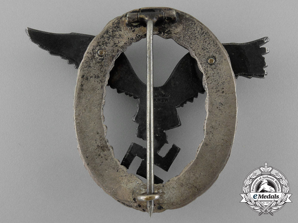 an_early_quality_luftwaffe_pilot’s_badge_by_c.e_juncker_of_berlin_e_1169