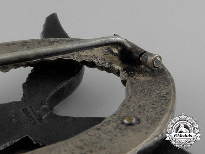 an_early_quality_luftwaffe_pilot’s_badge_by_c.e_juncker_of_berlin_e_1173