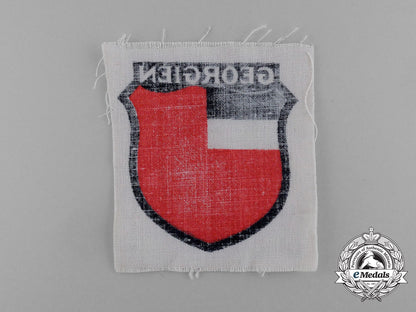 an_unissued_wehrmacht_heer(_army)“_georgien”_eastern_people’s_volunteer_sleeve_insignia_e_1192