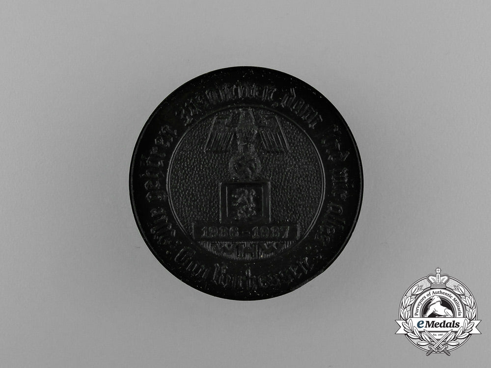a1936-1937_winter_relief_of_the_german_people_district_kurhessen_donation_badge_e_1210