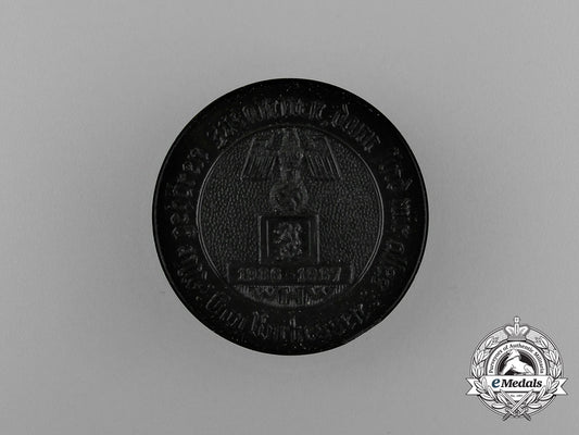 a1936-1937_winter_relief_of_the_german_people_district_kurhessen_donation_badge_e_1210