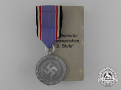 A Scarce Air Raid Defence “Luftschutz” Medal; Second Class (Light Version) In Its Original Box Of Issue