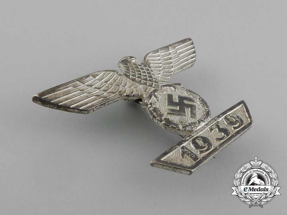 a_mint_cased_clasp_to_the_iron_cross1939_first_class;_type_ii_by_wilhelm_deumer_of_lüdenscheid_e_1647