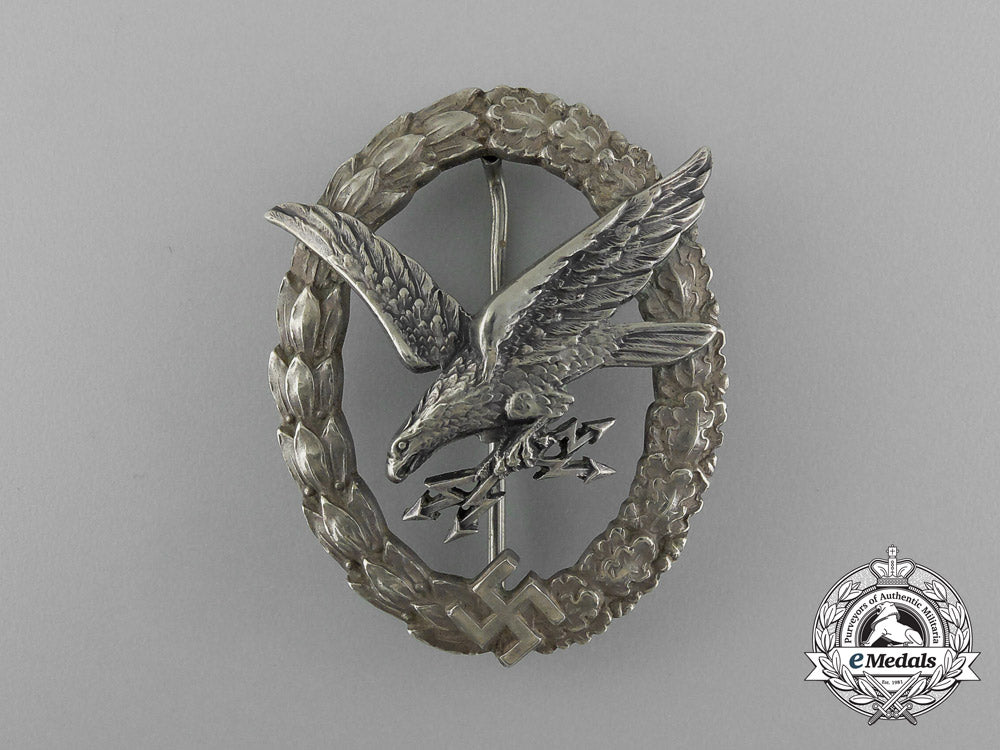 an_early_quality_cased_luftwaffe_radio_operator&_air_gunner_badge_by_c._e._juncker_e_1853