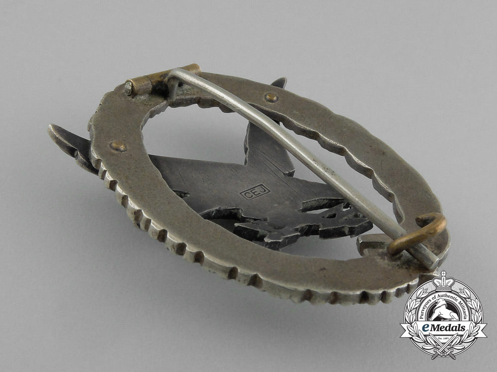 an_early_quality_cased_luftwaffe_radio_operator&_air_gunner_badge_by_c._e._juncker_e_1856