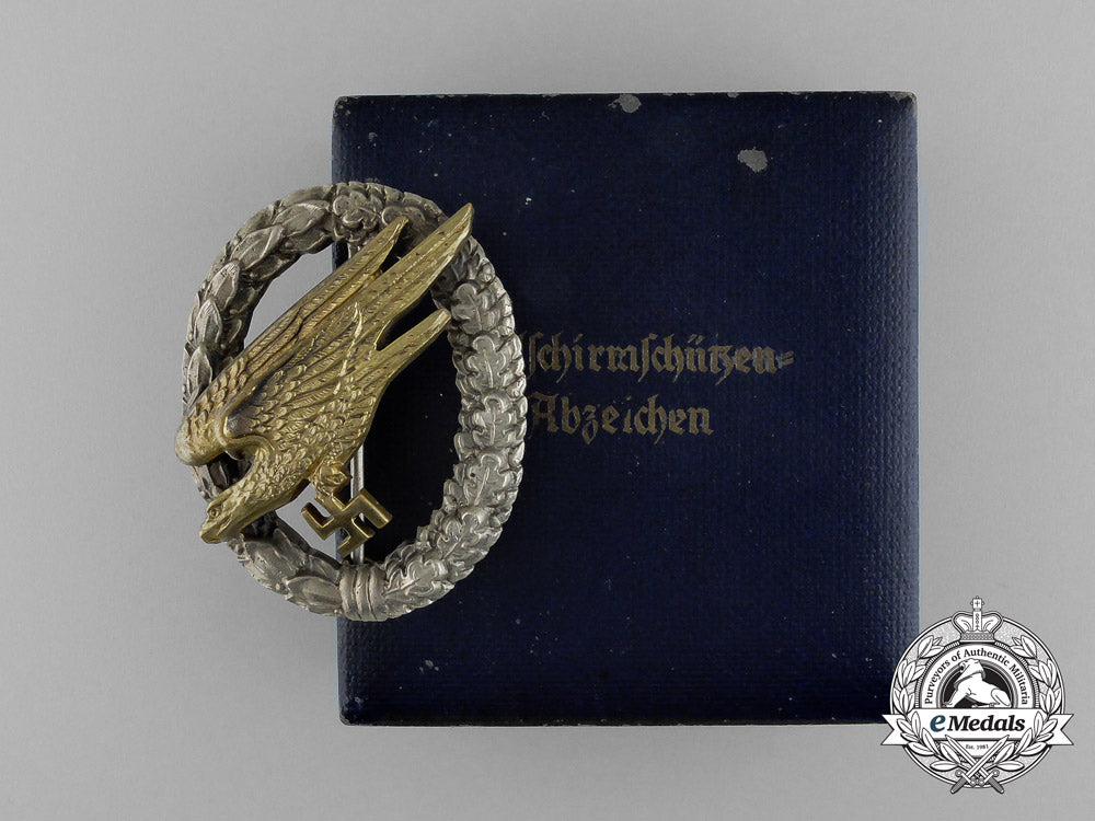 an_early_quality_cased_luftwaffe_paratrooper/_fallschirjäger_badge_by_c._e._juncker_e_1866