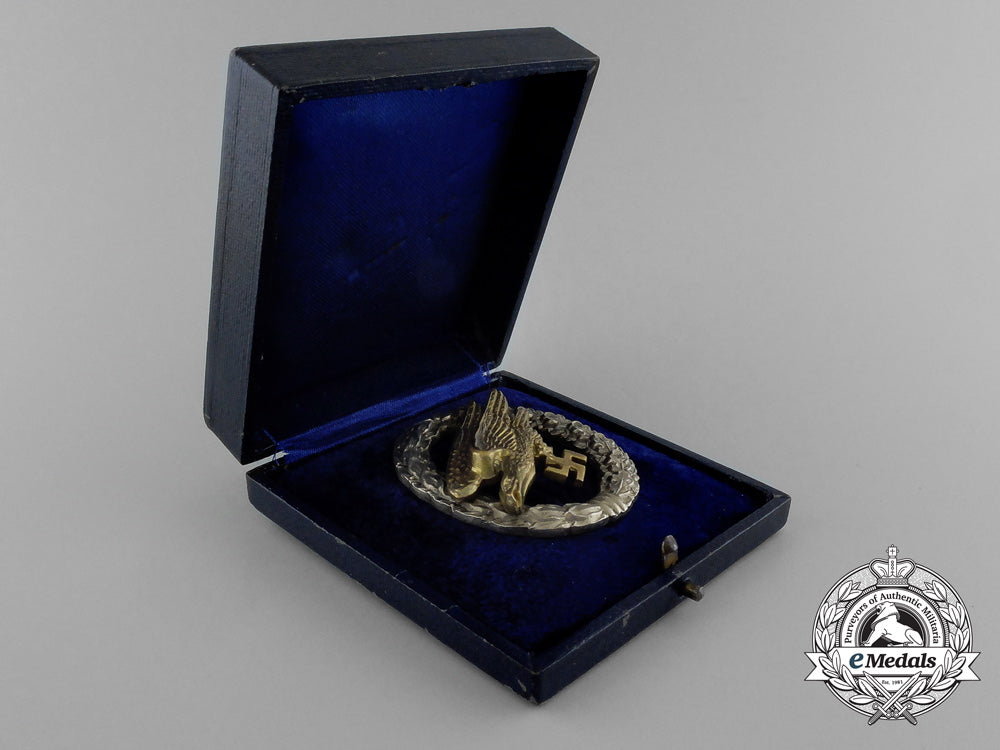 an_early_quality_cased_luftwaffe_paratrooper/_fallschirjäger_badge_by_c._e._juncker_e_1868