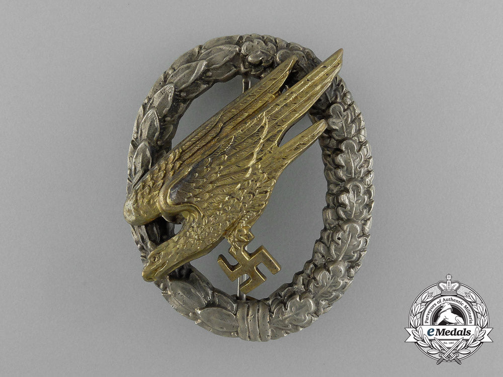 an_early_quality_cased_luftwaffe_paratrooper/_fallschirjäger_badge_by_c._e._juncker_e_1869