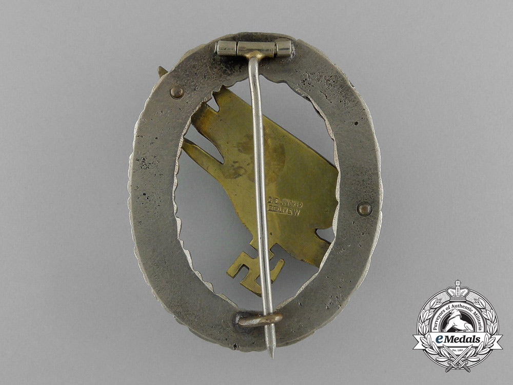 an_early_quality_cased_luftwaffe_paratrooper/_fallschirjäger_badge_by_c._e._juncker_e_1870