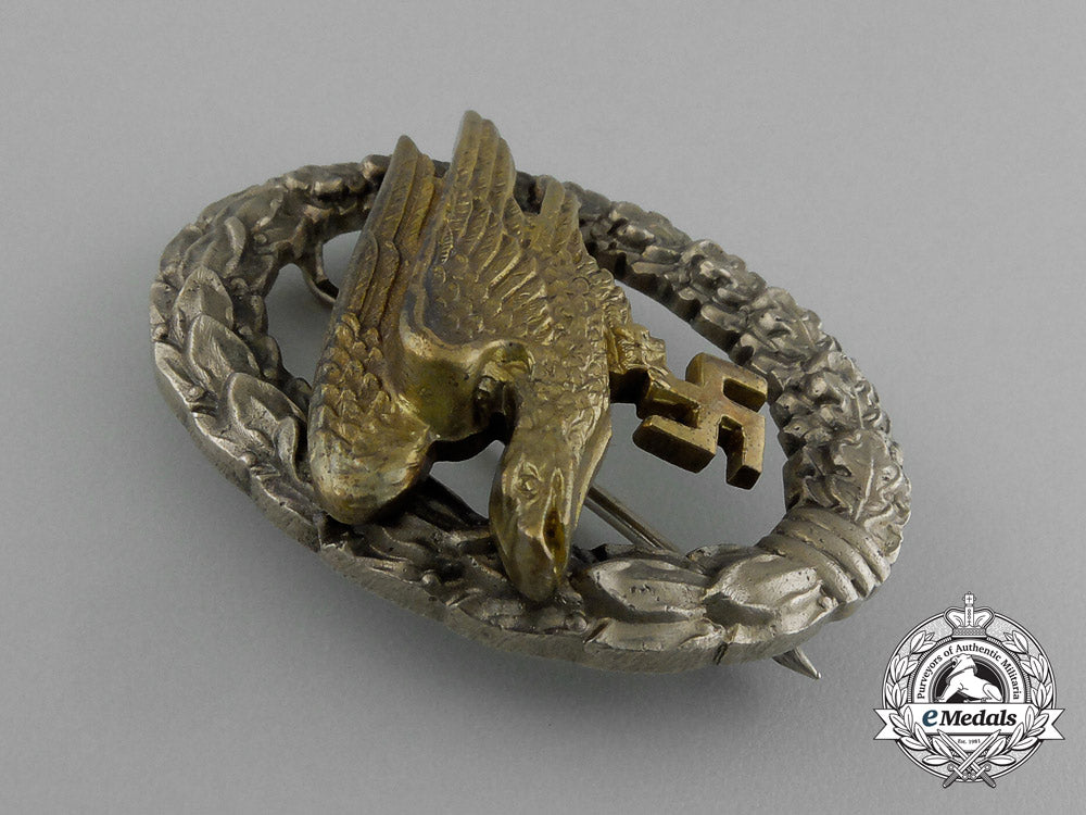 an_early_quality_cased_luftwaffe_paratrooper/_fallschirjäger_badge_by_c._e._juncker_e_1871