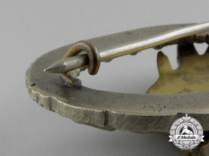 an_early_quality_cased_luftwaffe_paratrooper/_fallschirjäger_badge_by_c._e._juncker_e_1873