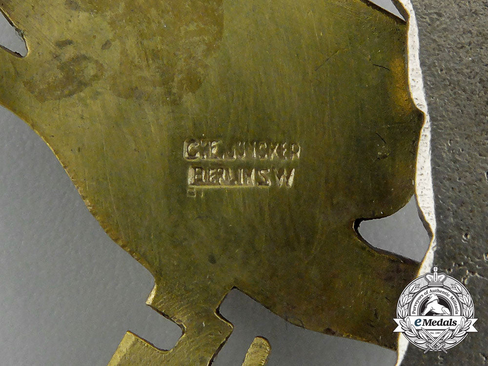 an_early_quality_cased_luftwaffe_paratrooper/_fallschirjäger_badge_by_c._e._juncker_e_1875