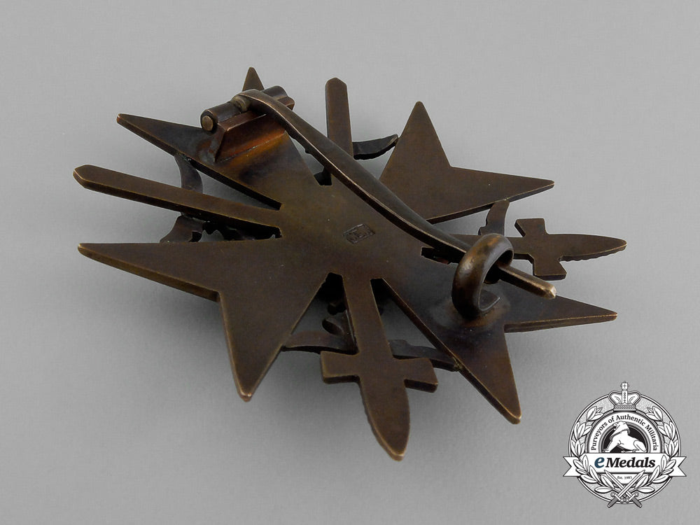 a_bronze_grade_spanish_cross_with_swords_by_c._e._juncker_in_its_original_case_of_issue_e_1883
