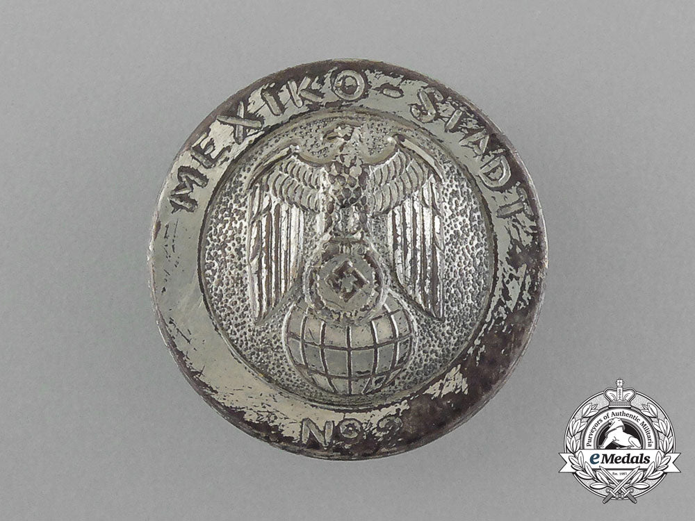 a_scarce_german_mexico_city_embassy_employee’s_badge_in_its_original_case_of_issue_e_2039