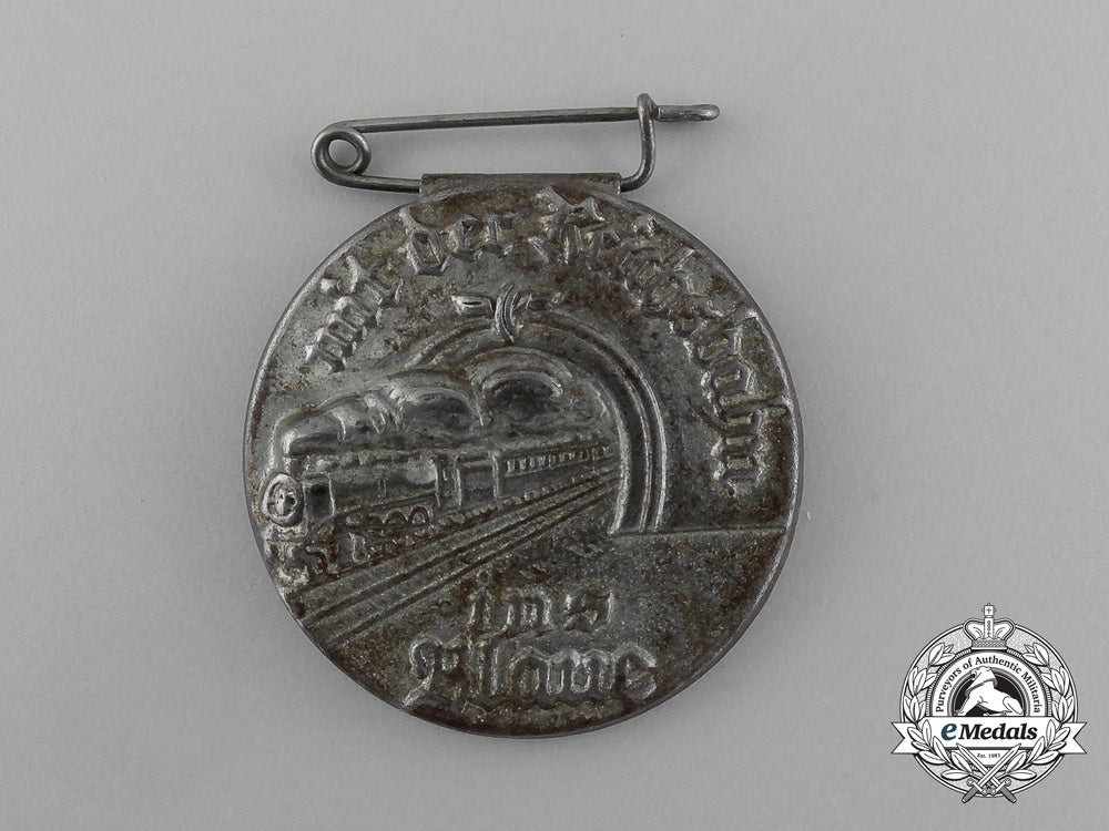 a“_traveling_on_a_whim_with_the_reichsbahn”_badge_e_2064