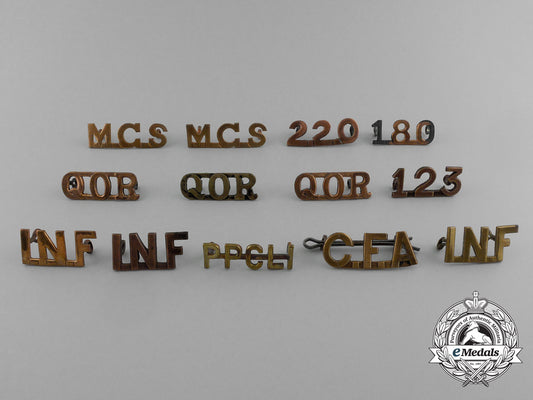 thirteen_first_war_canadian_shoulder_titles_e_2372