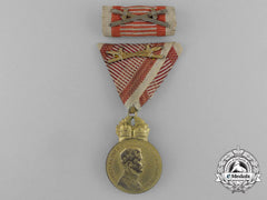 An Austrian Military Merit Medal; Bronze Grade, Karl I (1917-1918) And Silver Grade Ribbon Bar