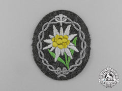 A Mint Wehrmacht Heer (Army) Officer’s Edelweiss Badge