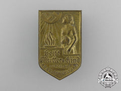 A National Socialist People’s Welfare “Aid Mother And Child” Donation Badge