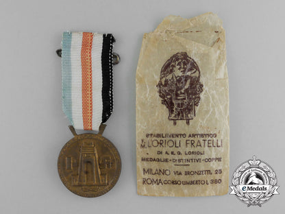 a_german-_italian_africa_campaign_medal_with_its_original_packet_of_issue_by_lorioli_fratelli_e_3977