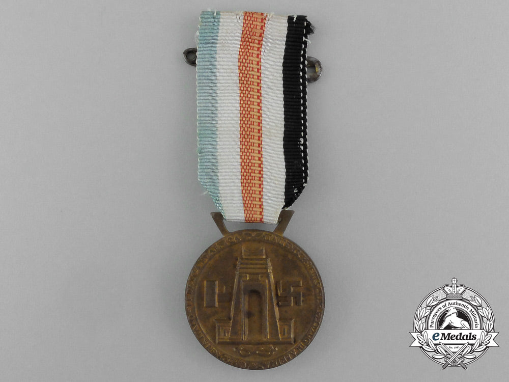 a_german-_italian_africa_campaign_medal_with_its_original_packet_of_issue_by_lorioli_fratelli_e_3978