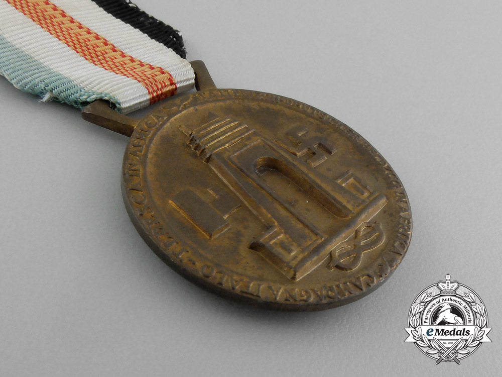 a_german-_italian_africa_campaign_medal_with_its_original_packet_of_issue_by_lorioli_fratelli_e_3983