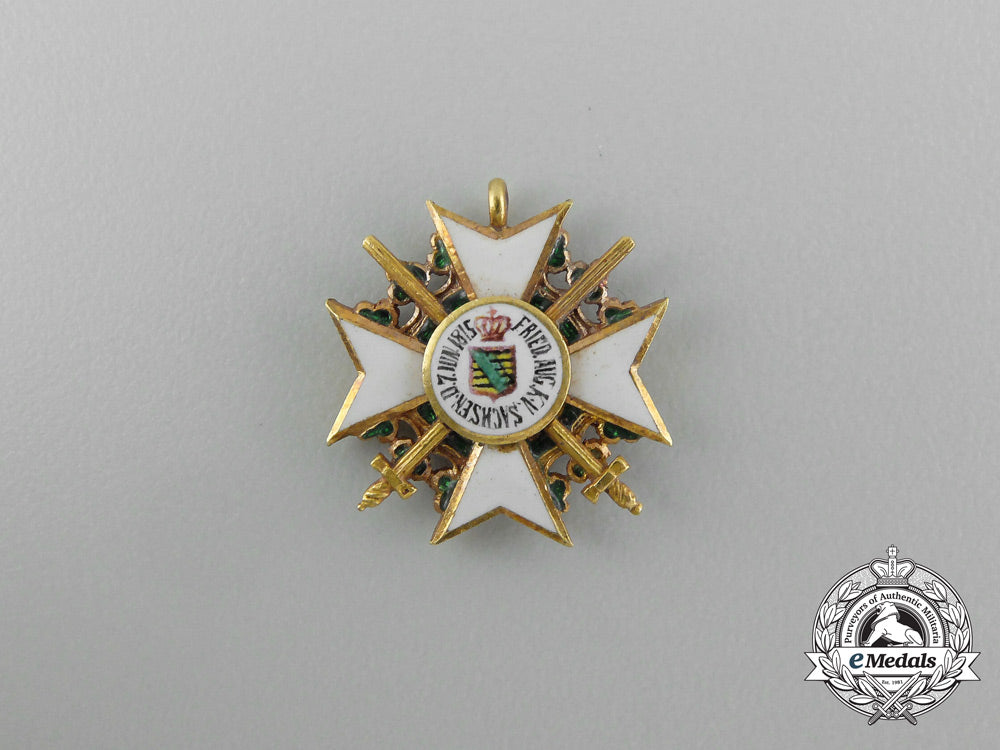 a_miniature_saxon_civil_merit_order_with_swords_in_gold_e_3991