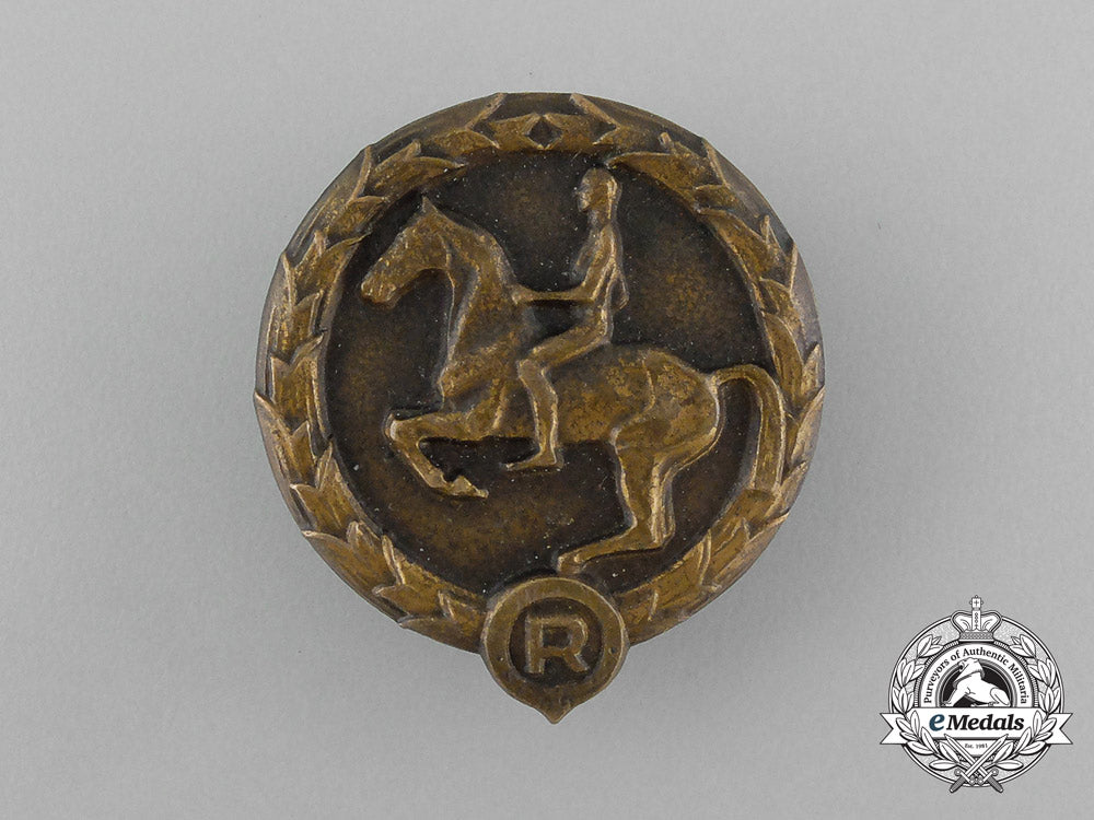 germany,_third_reich._a_youths_equestrian_badge,_by_christian_lauer_of_nürnberg_e_4048_2