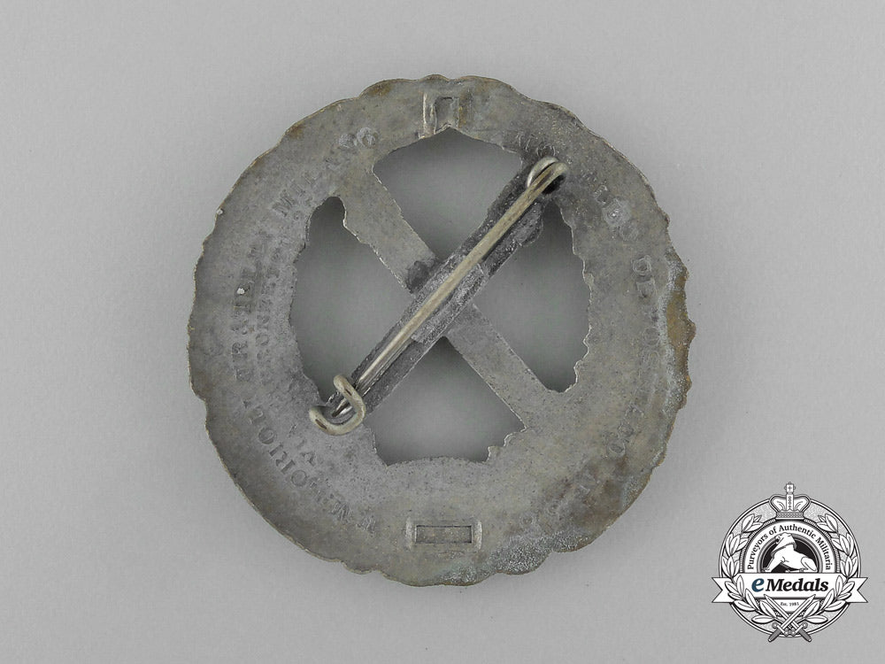 a_second_war_italian_russian_front_honour_badge_by_lorioli_fratelli_in_its_original_packet_of_issue_e_4052