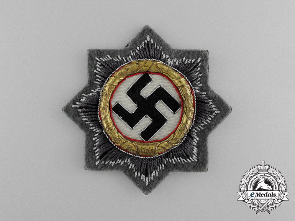 a_mint_wehrmacht_heer(_army)_issue_german_cross_in_gold;_cloth_version_by_c._e_juncker_e_4204