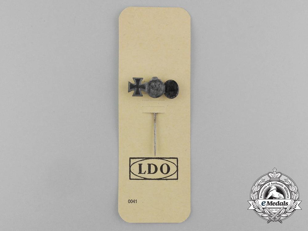 a_second_war_german_miniature_iron_cross_stickpin_grouping_on_its_ldo_salesman’s_board_e_4441