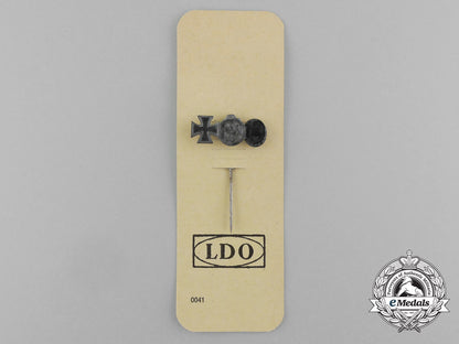 a_second_war_german_miniature_iron_cross_stickpin_grouping_on_its_ldo_salesman’s_board_e_4441