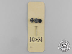 A Second War German Miniature Iron Cross Stickpin Grouping On Its Ldo Salesman’s Board